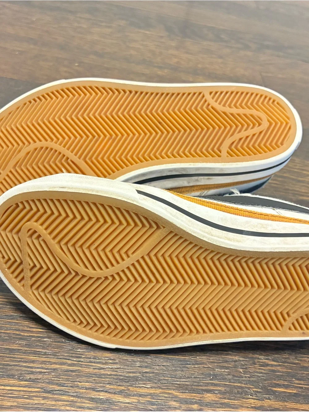 Nike Kids White Sneakers with Black Swoosh and Tan Trim